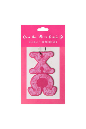 Pink floral air freshener with design in packaging on a white background
