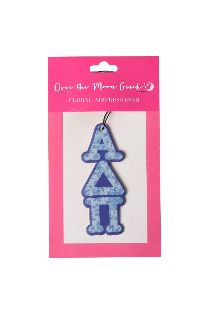 Floral air freshener with blue design on pink packaging