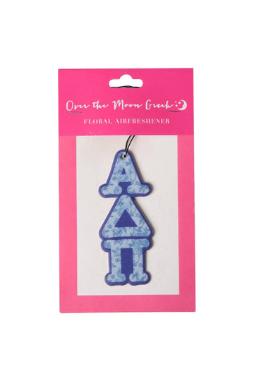 Floral air freshener with blue design on pink packaging