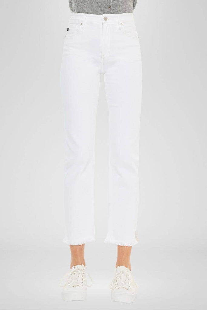 White jeans worn by a person on a white background