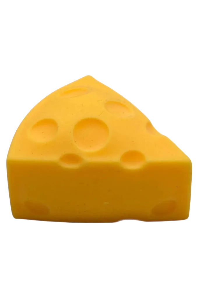 Yellow cheese wedge with holes on a white background