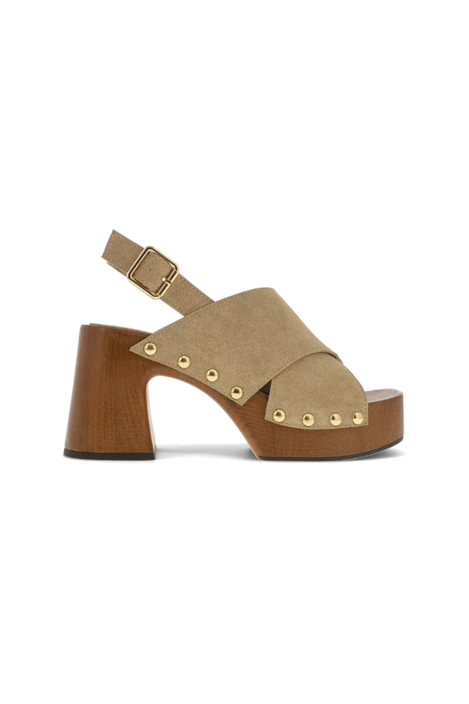 Beige sandal with wooden heel on a white background