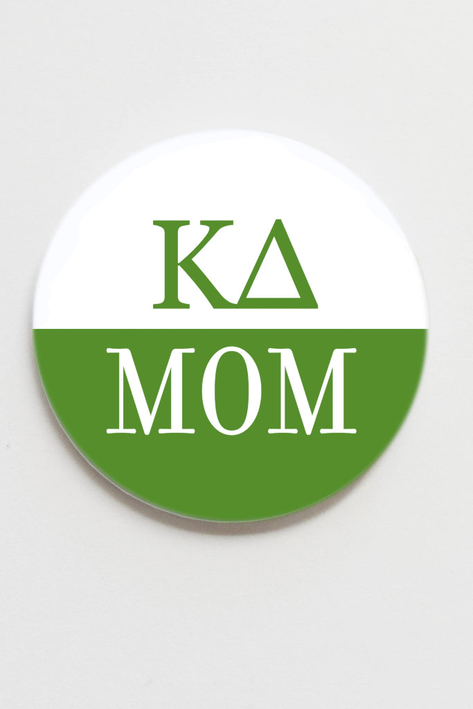 Round green and white button with 'Kappa Delta Mom' text on a light gray background