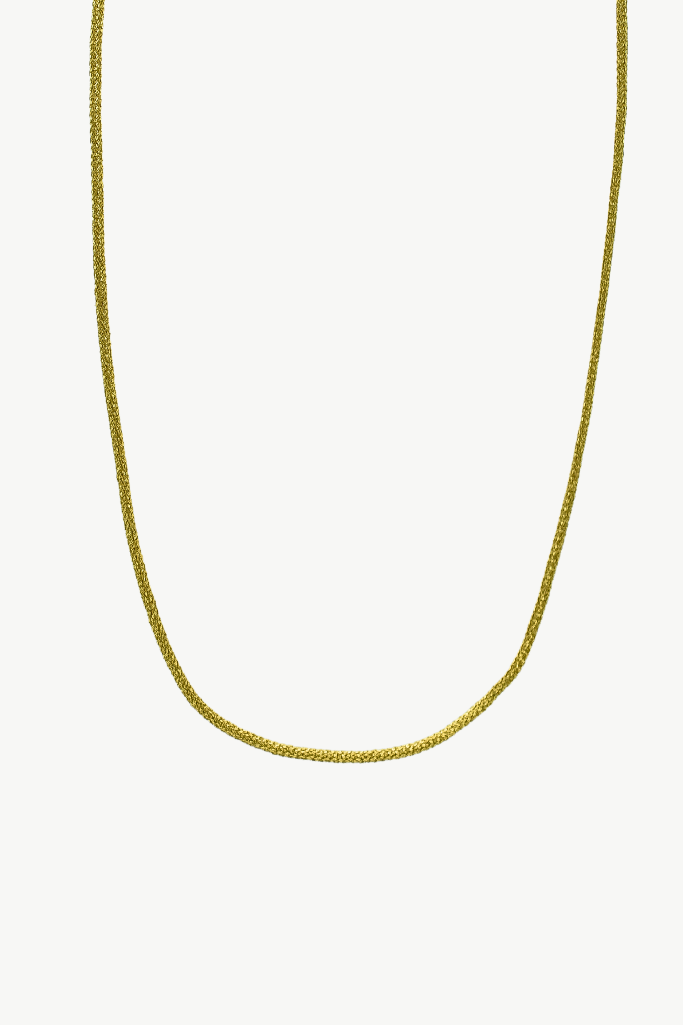 A delicate gold chain necklace shown against a plain white background.